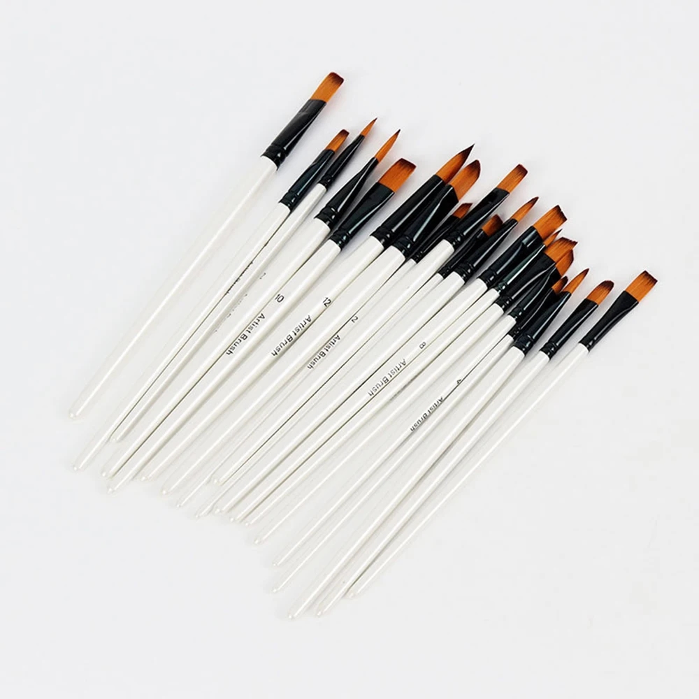 Close-up of the wooden handles of the artistic brushes
