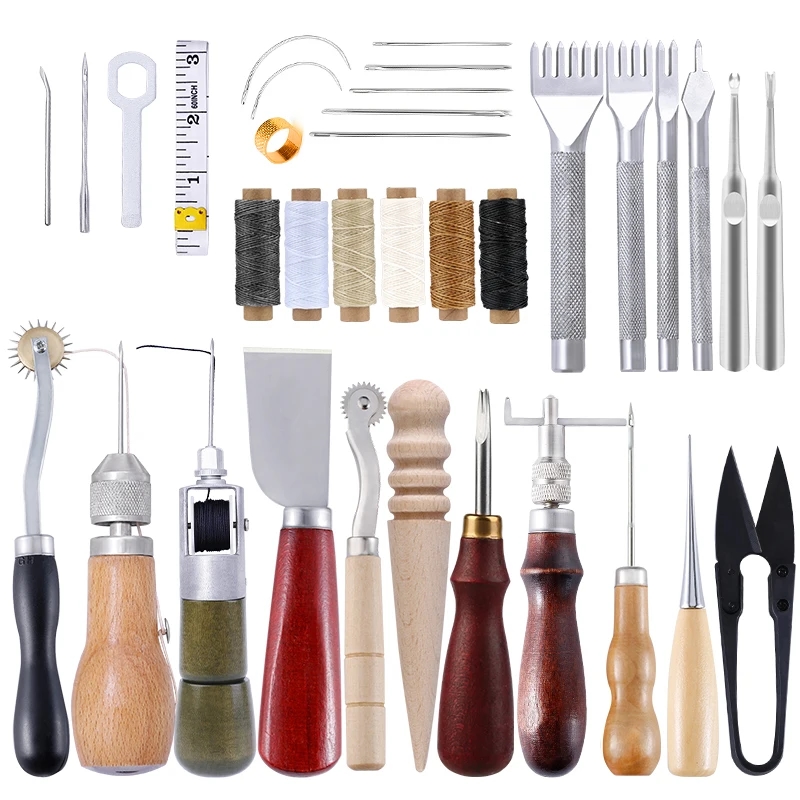 A variety of tools for leatherworking, including sewing needles and waxed thread