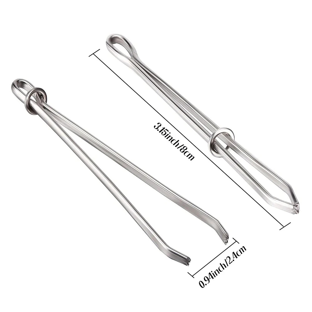 Close-up of a metal clip with flexible grips