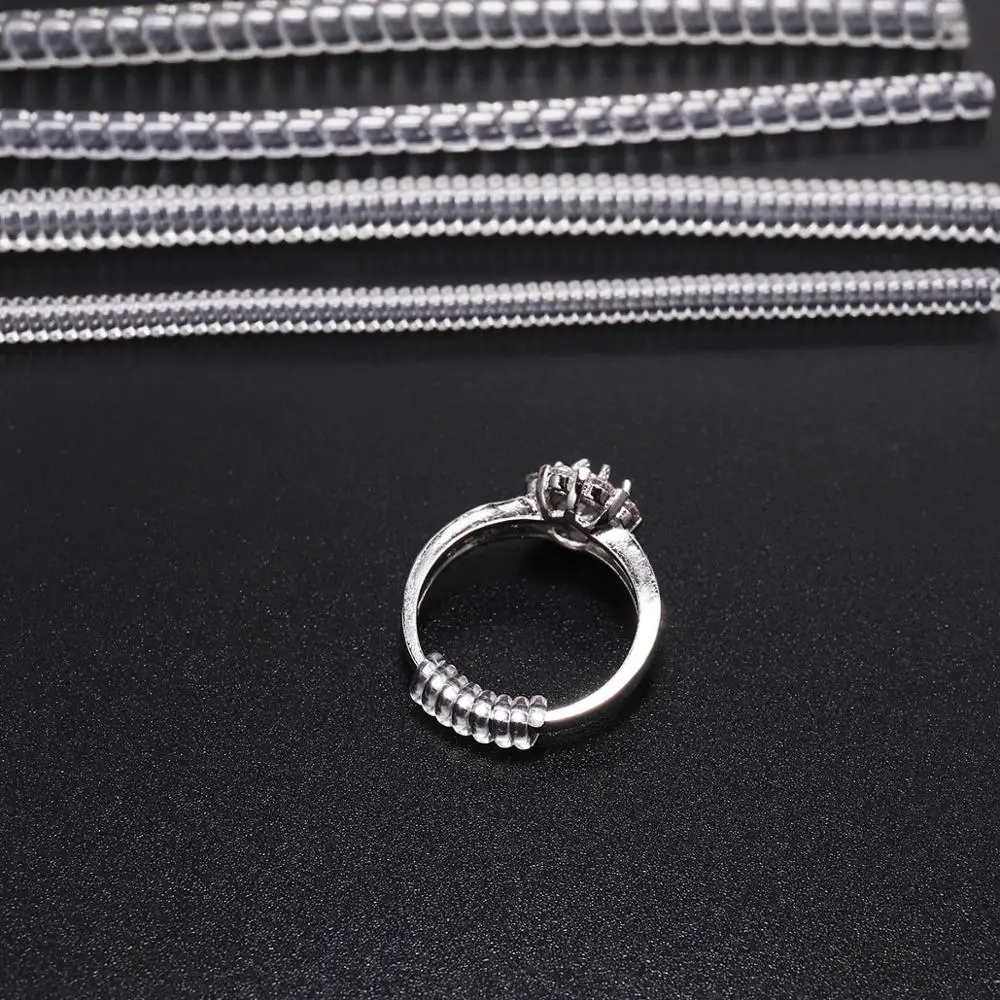 Silicone adjusters inserted inside rings help adjust the size