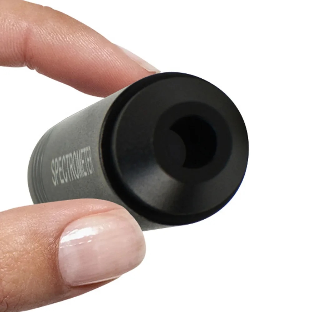 The side view shows the structure of the compact spectroscope