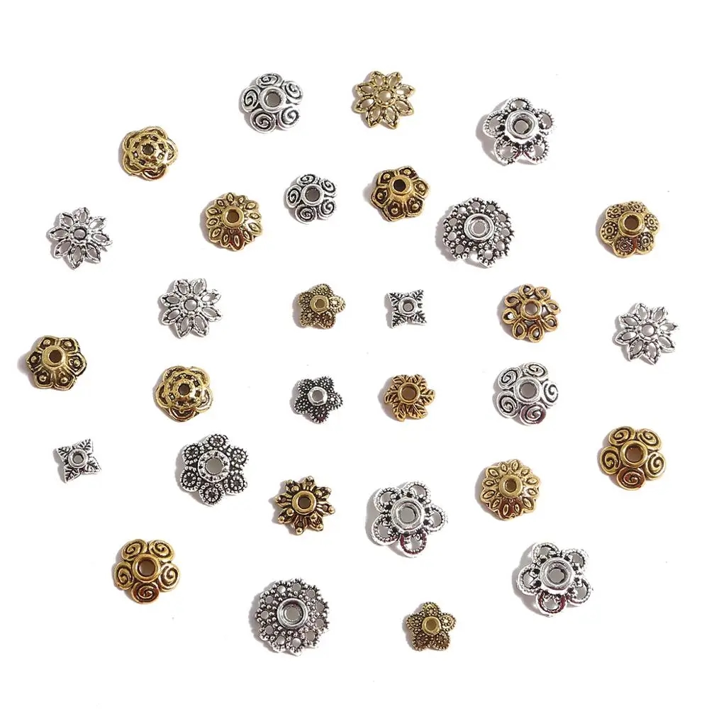 Assortment of metal bead caps in golden, silver and other shades