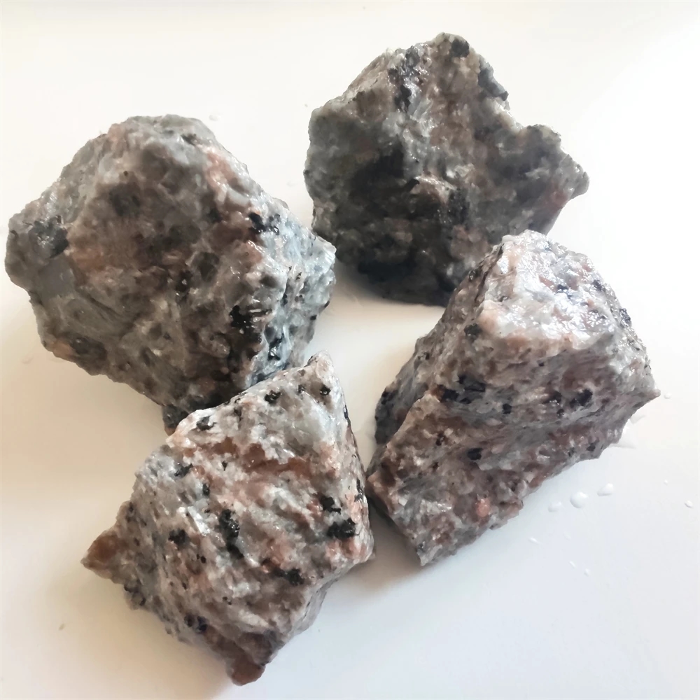 Yooperlites under ultraviolet light highlighting their bright fluorescent glow