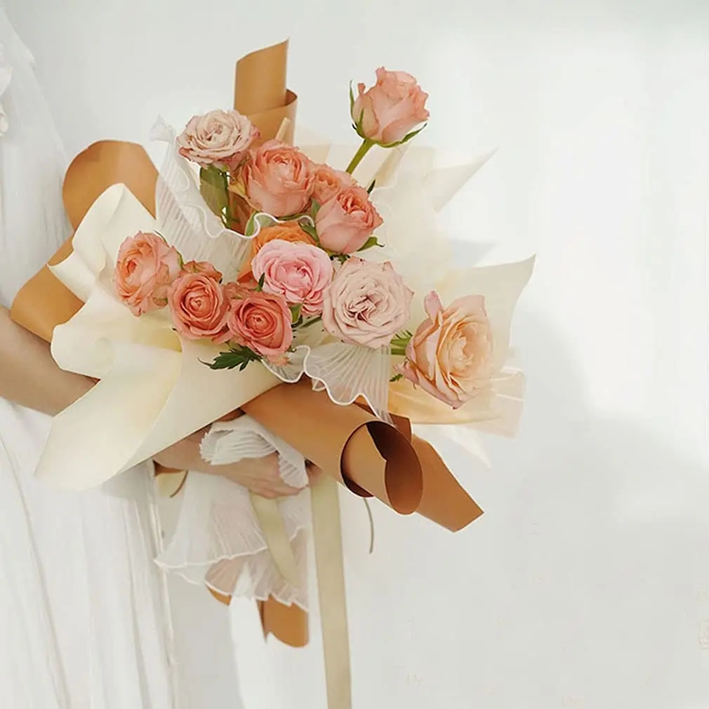 Bouquet packaging in classic black color with a golden edge