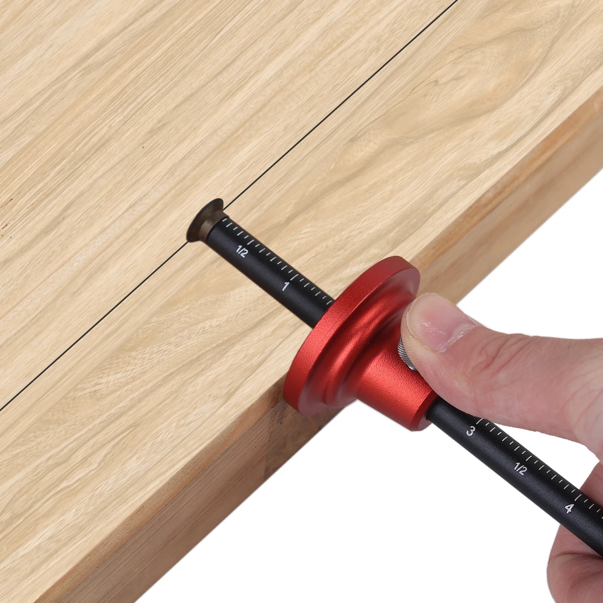 Marking tool showing its metric and inch scales for convenience of use
