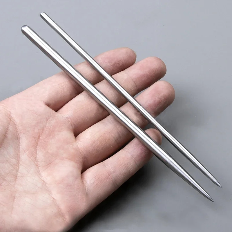 Close-up of steel tools for texturing and pressing clay