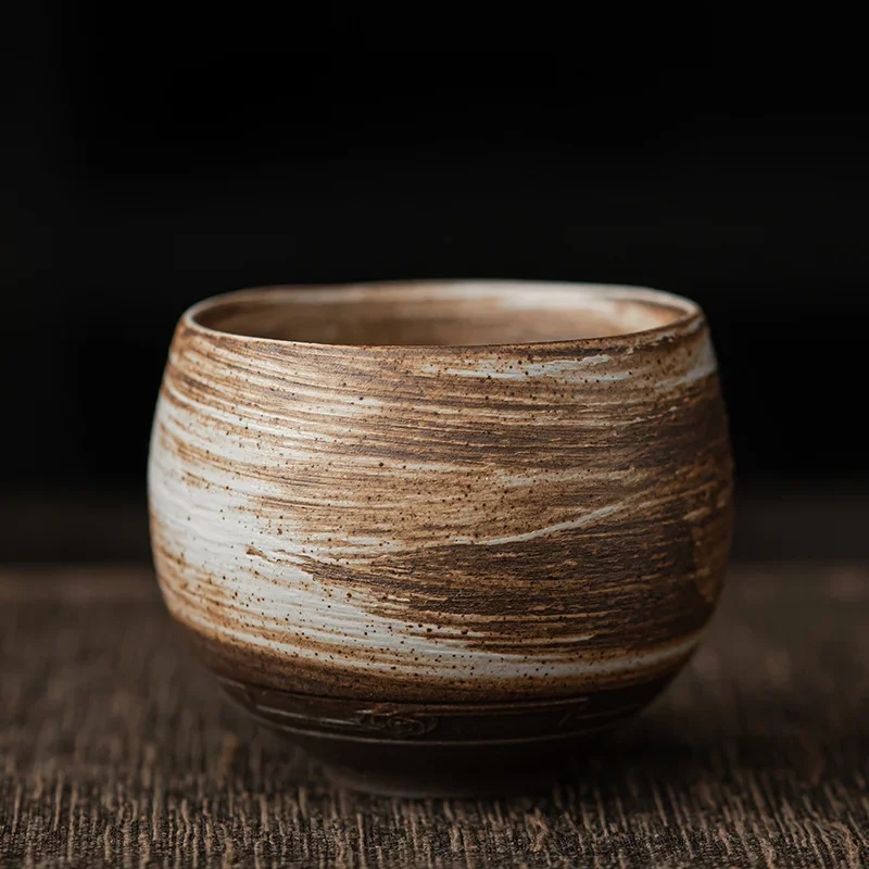 Detailed view of the unique embossed pattern on the surface of the ceramic cup