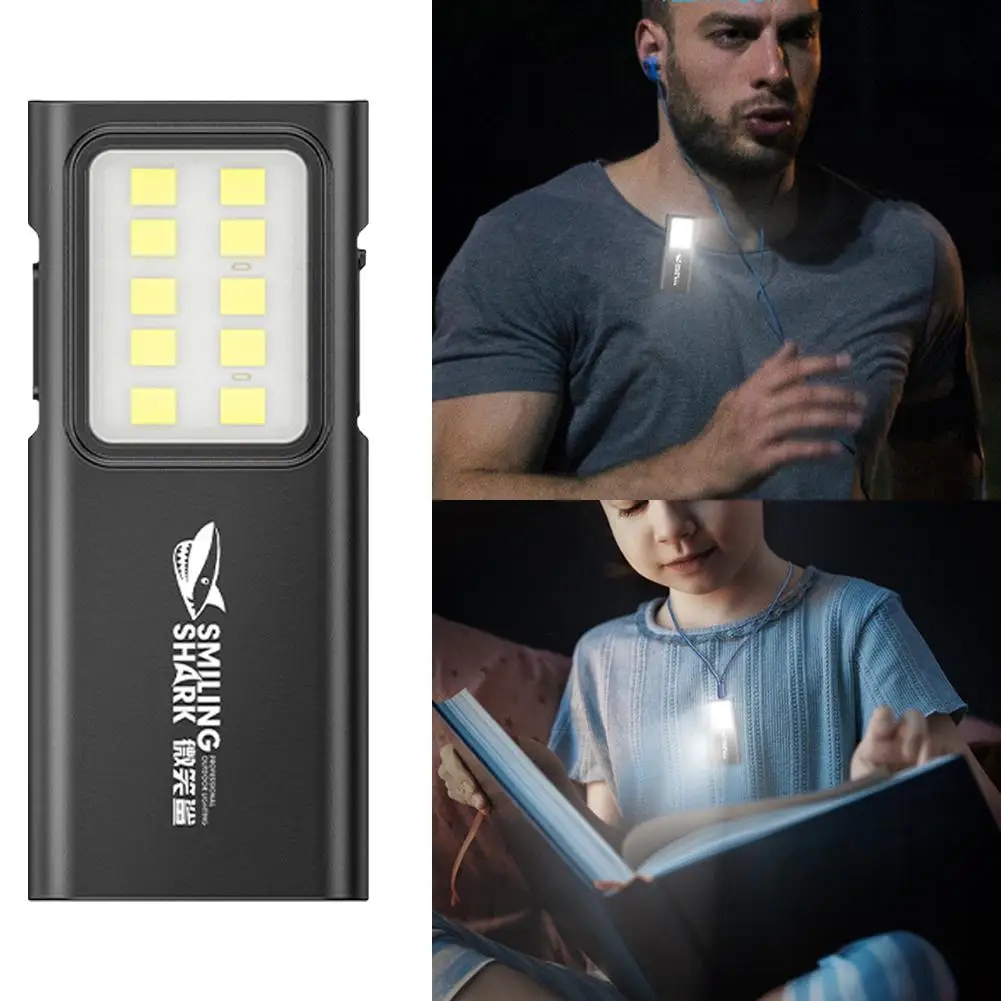 Close-up of a compact flashlight with a clip for attachment