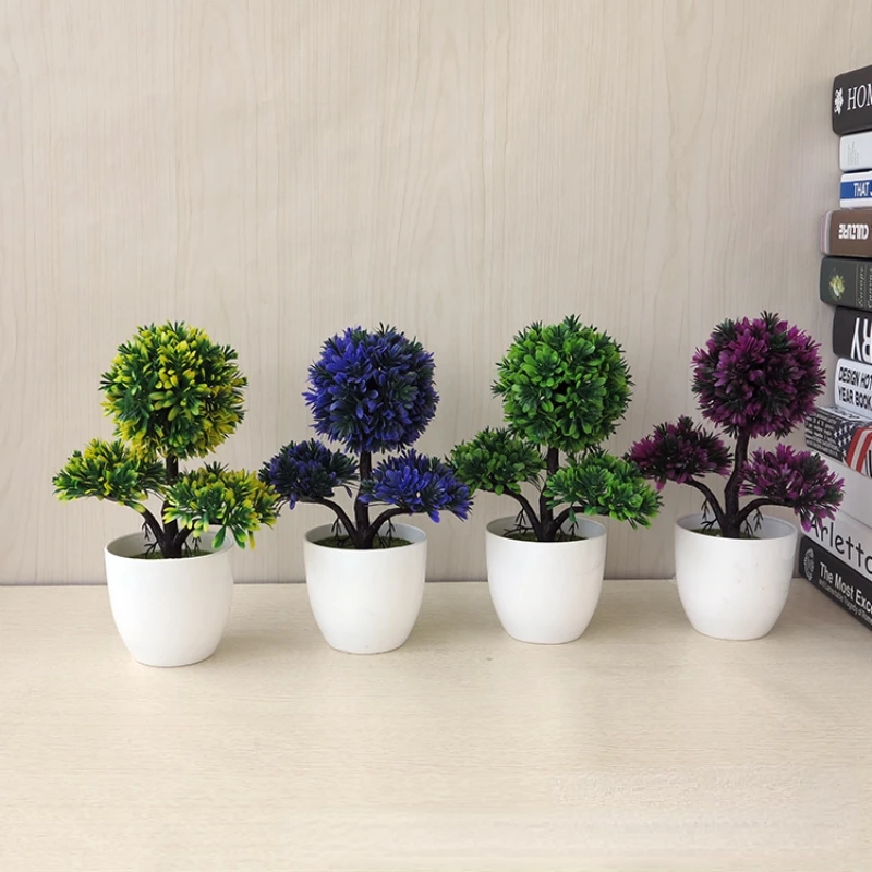 Small artificial bonsai with pink foliage, stylish decor element for home or office