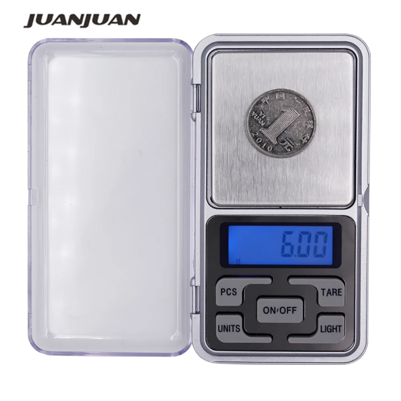 Close-up of compact digital scales on a white background