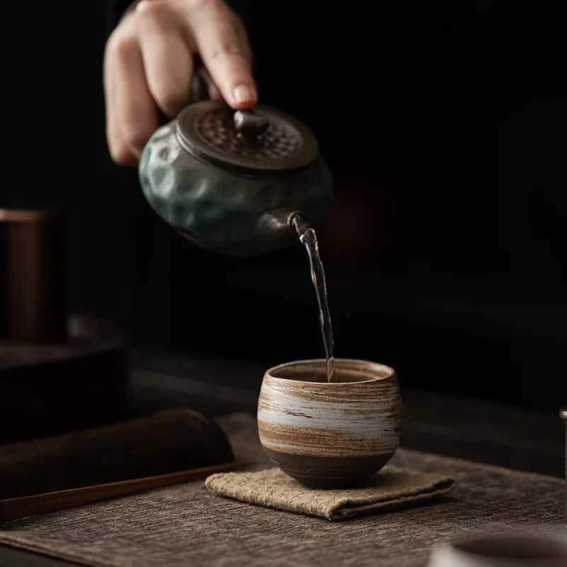 Comfortable clay cup with thin walls fits perfectly in the hand