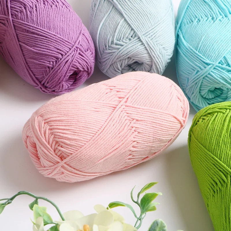 Assortment of bright colors of cotton yarn, ideal for knitting