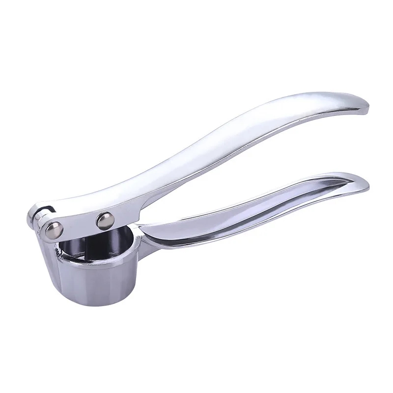 Garlic press showing its practicality in action