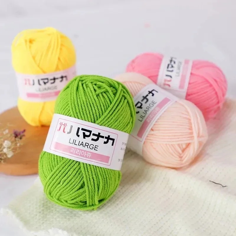 Close-up of the neat packaging with spools of soft cotton yarn