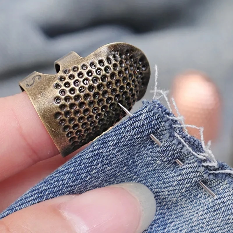 Comfortable thimble made of bronze metal, perfectly suited for long sewing