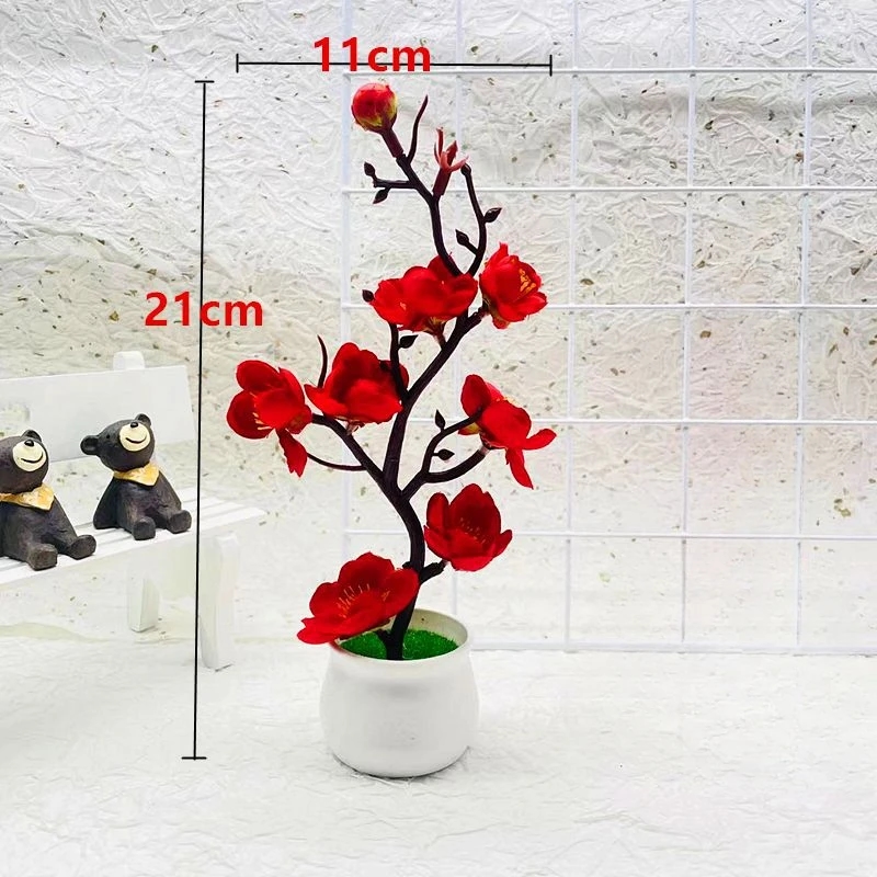 Elegant artificial bonsai plant with white flowers, adding sophistication to the interior