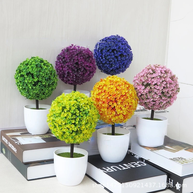 Miniature plastic bonsai with realistic texture, fits well in office space