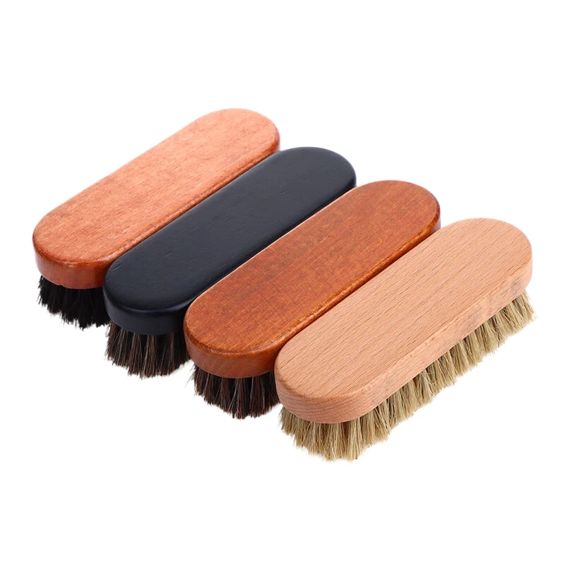 Brosse avec poils doux, idéale pour nettoyer les surfaces délicates