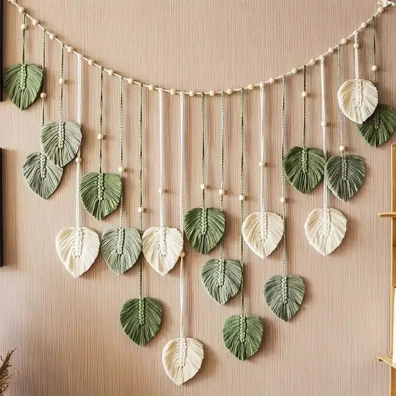Beautiful macrame wall hanging with leaves, creating a cozy atmosphere