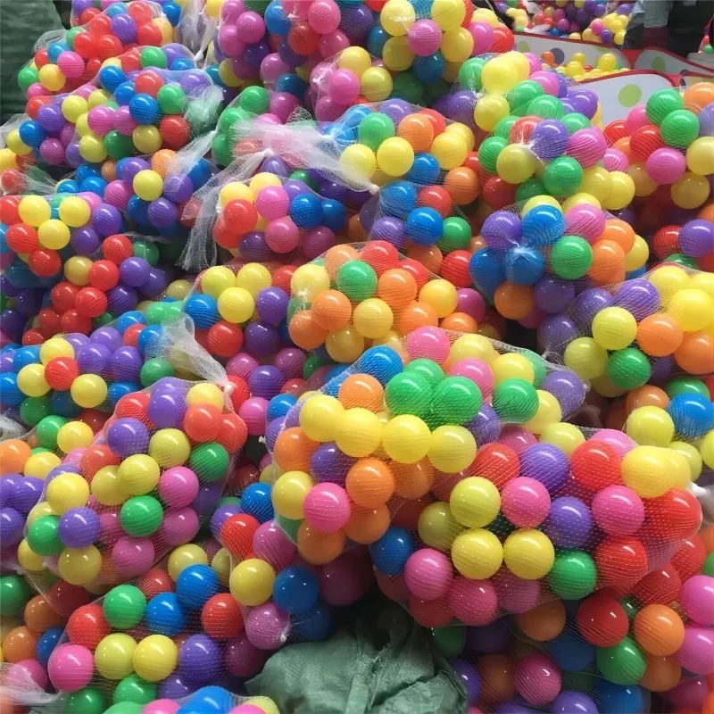 Bright orange, blue, green and purple plastic balls packed in a net