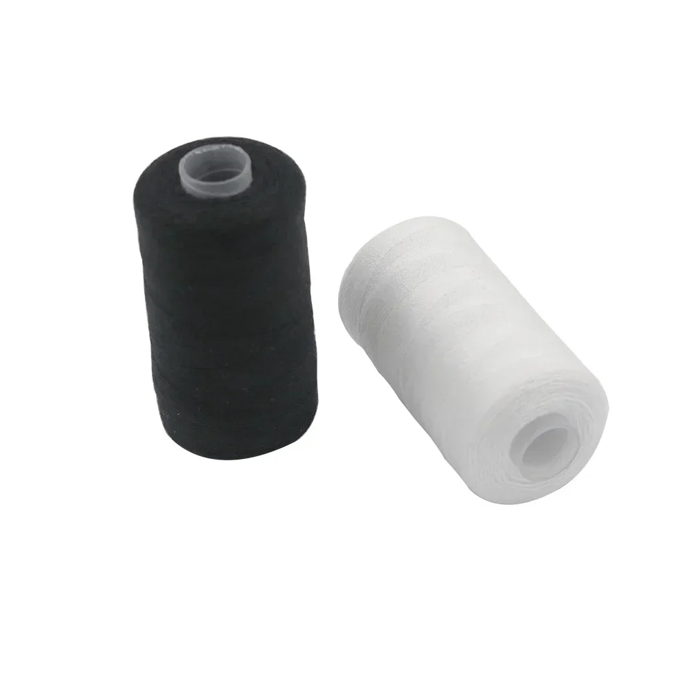 Two spools with black and white polyester threads