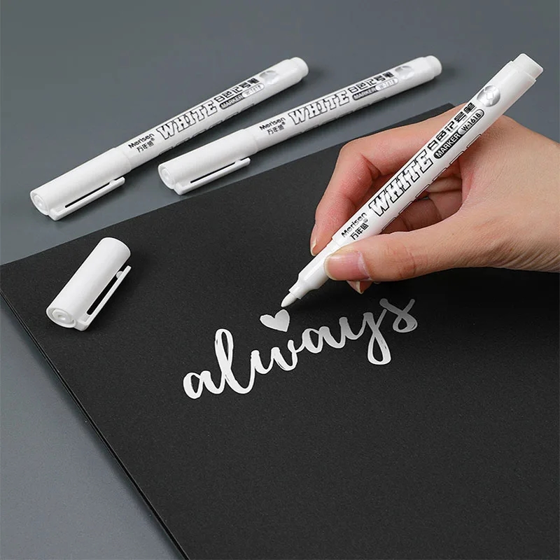 Close-up of the marker tip, demonstrating the bright and dense white ink