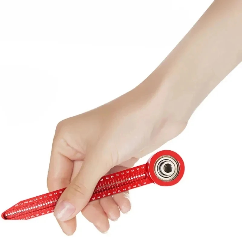 A multifunctional measuring tool surrounded by other necessary tools for working with wood