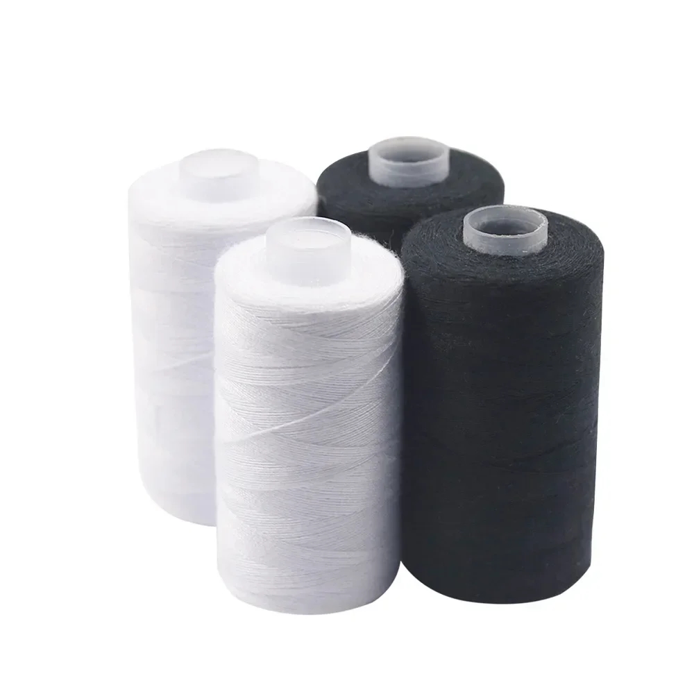 Two colors of polyester sewing threads on spools