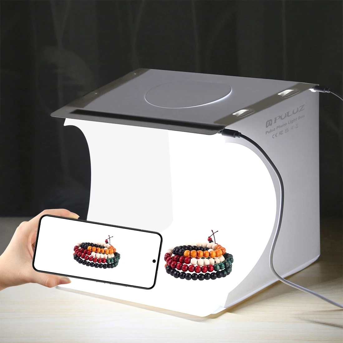 Compact and foldable photography set with two LED panels and 6 colored backdrops