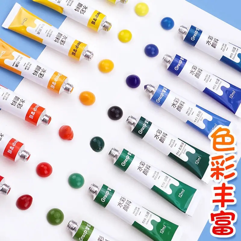 Multicolored watercolor paints in tubes with a brush