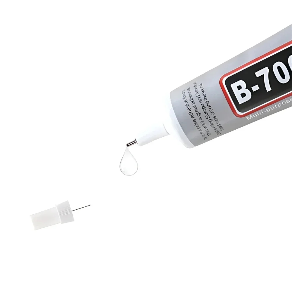 A craftsman using B-7000 adhesive for making jewelry
