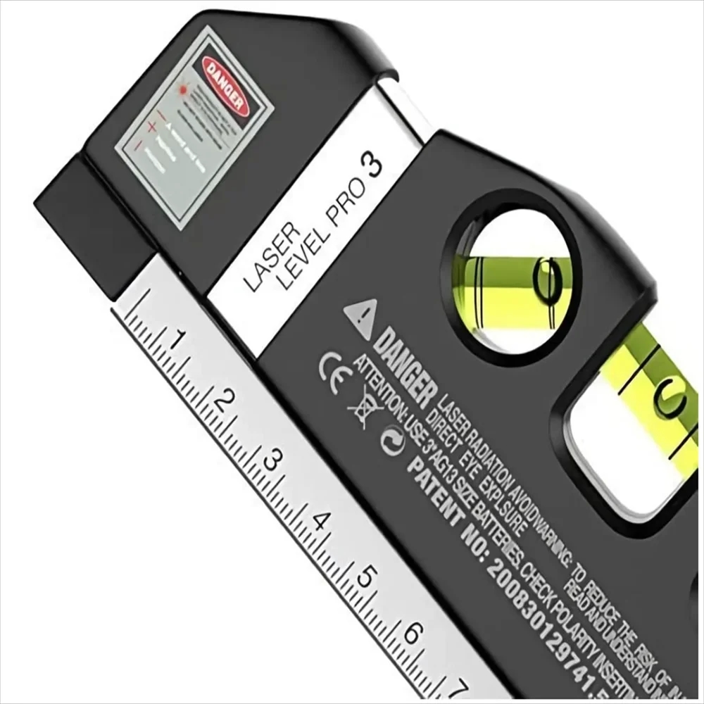 Laser level in use for aligning horizontal and vertical surfaces
