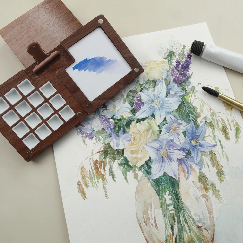 Image of a compact wooden painting palette