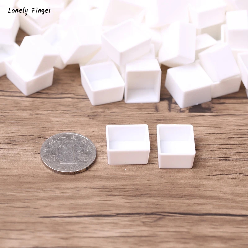 Close-up of plastic half-pans with dimensions