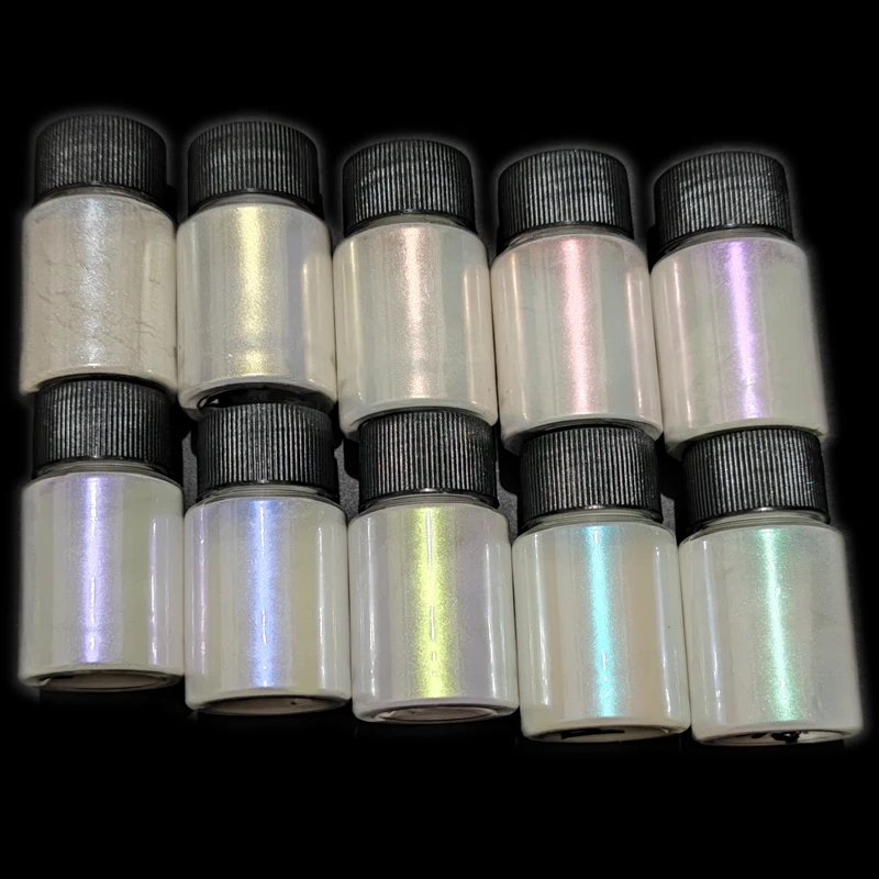 Various colors of pearlescent pigments in jars