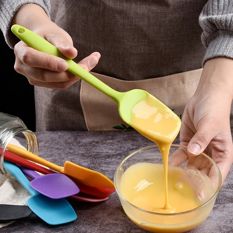 Red silicone spatula, perfect for baking and desserts