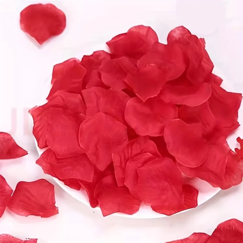 Many pink artificial rose petals
