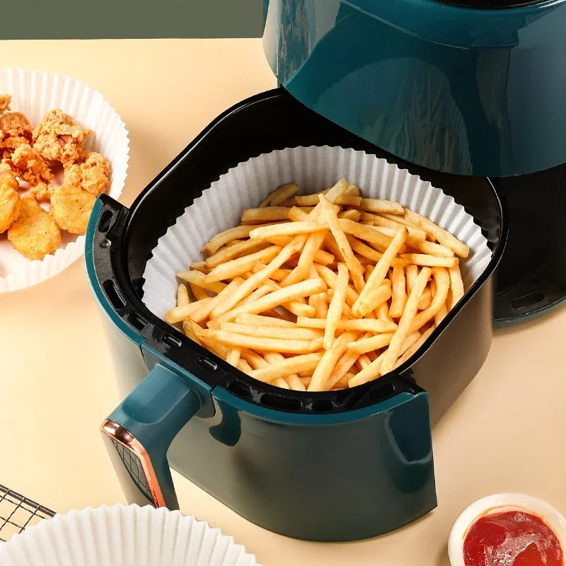 Stack of disposable paper liners for air fryer