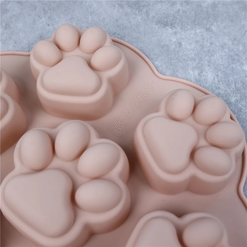 Variety of desserts in the shape of cat paws for holidays and family events
