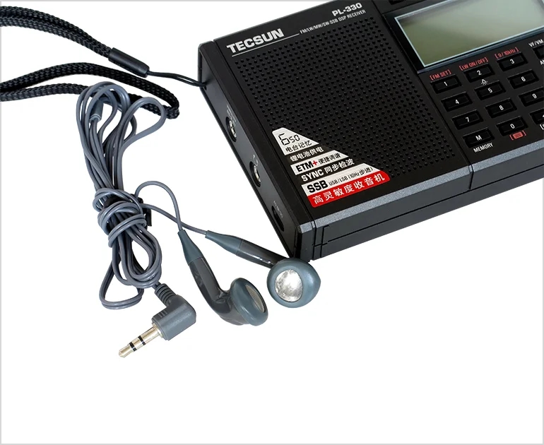 Compact size of Tecsun PL-330 compared to other radio models
