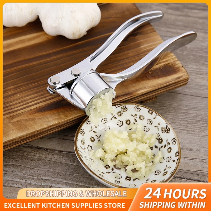 Effective garlic press in action, perfect for kitchen tasks