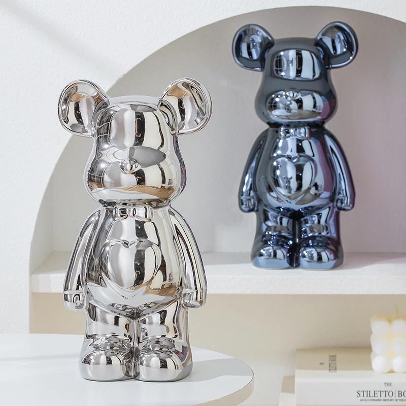 Ceramic bear statuette in a rich red color, giving the product a luxurious look
