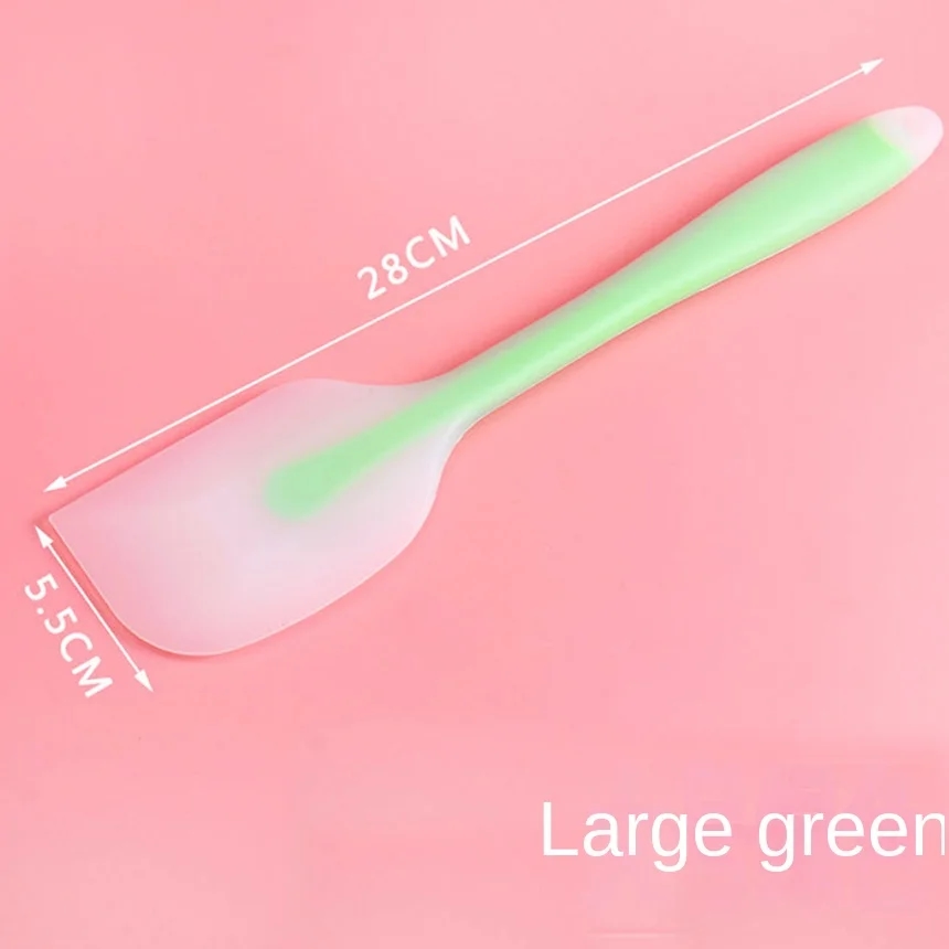 케이크를 만들기에 완벽한 분홍색 베이킹 주걱