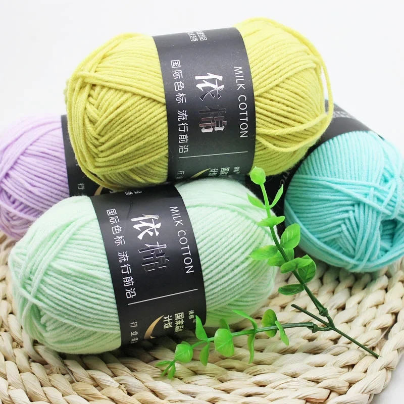 Many multicolored yarn balls, demonstrating a rich palette