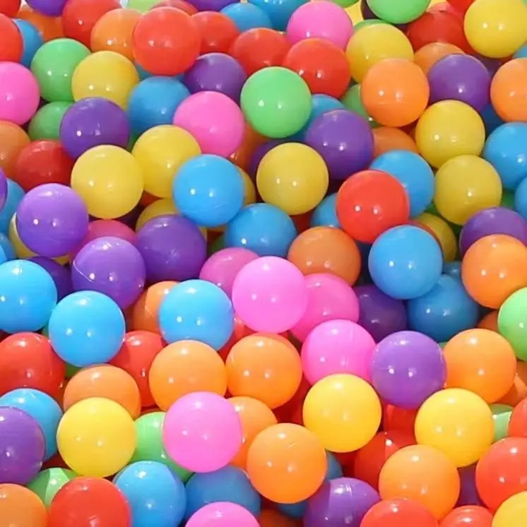 Brightly colored plastic balls scattered across a children's playground