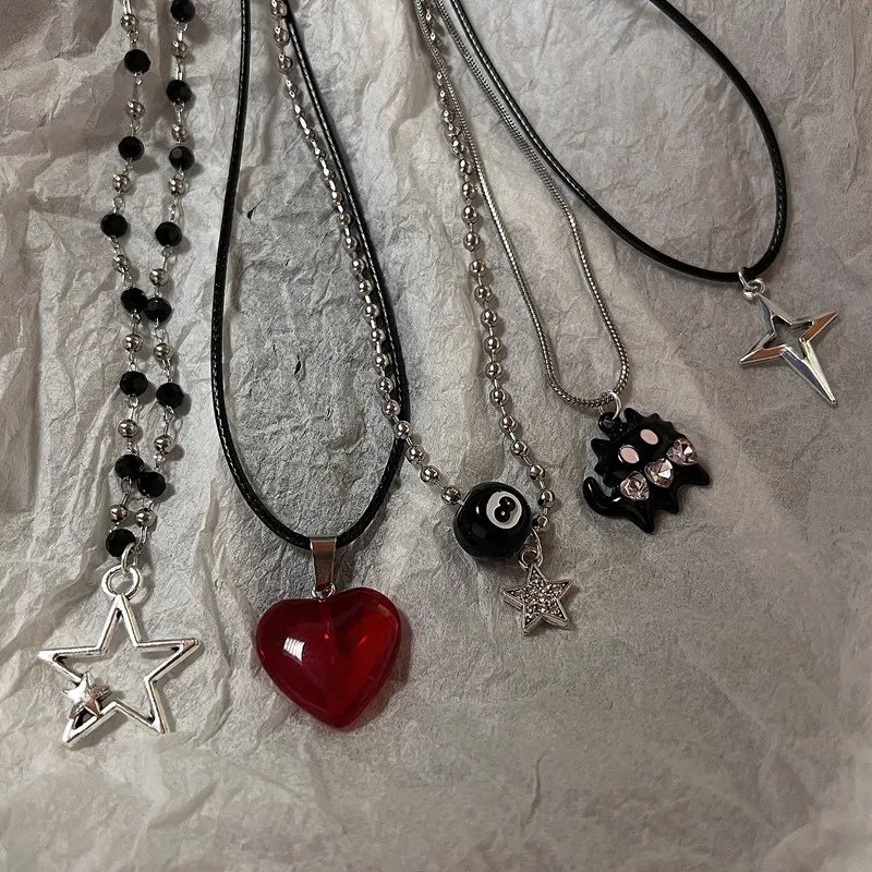 Star-shaped pendant with leather cord on a woman's neck