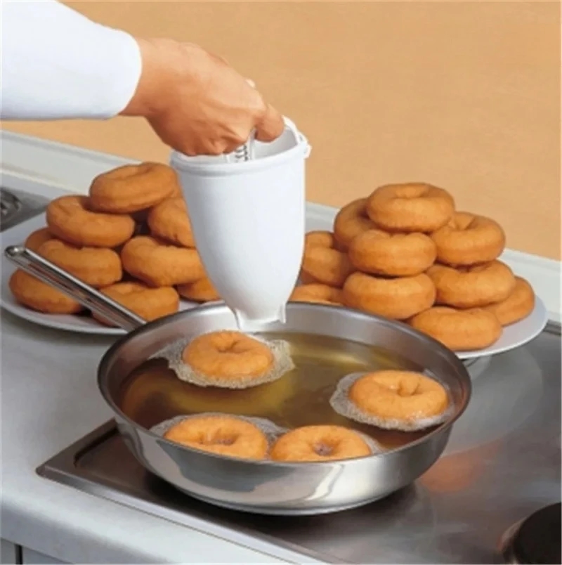 Close-up of a donut mold with a set of interchangeable nozzles of different shapes