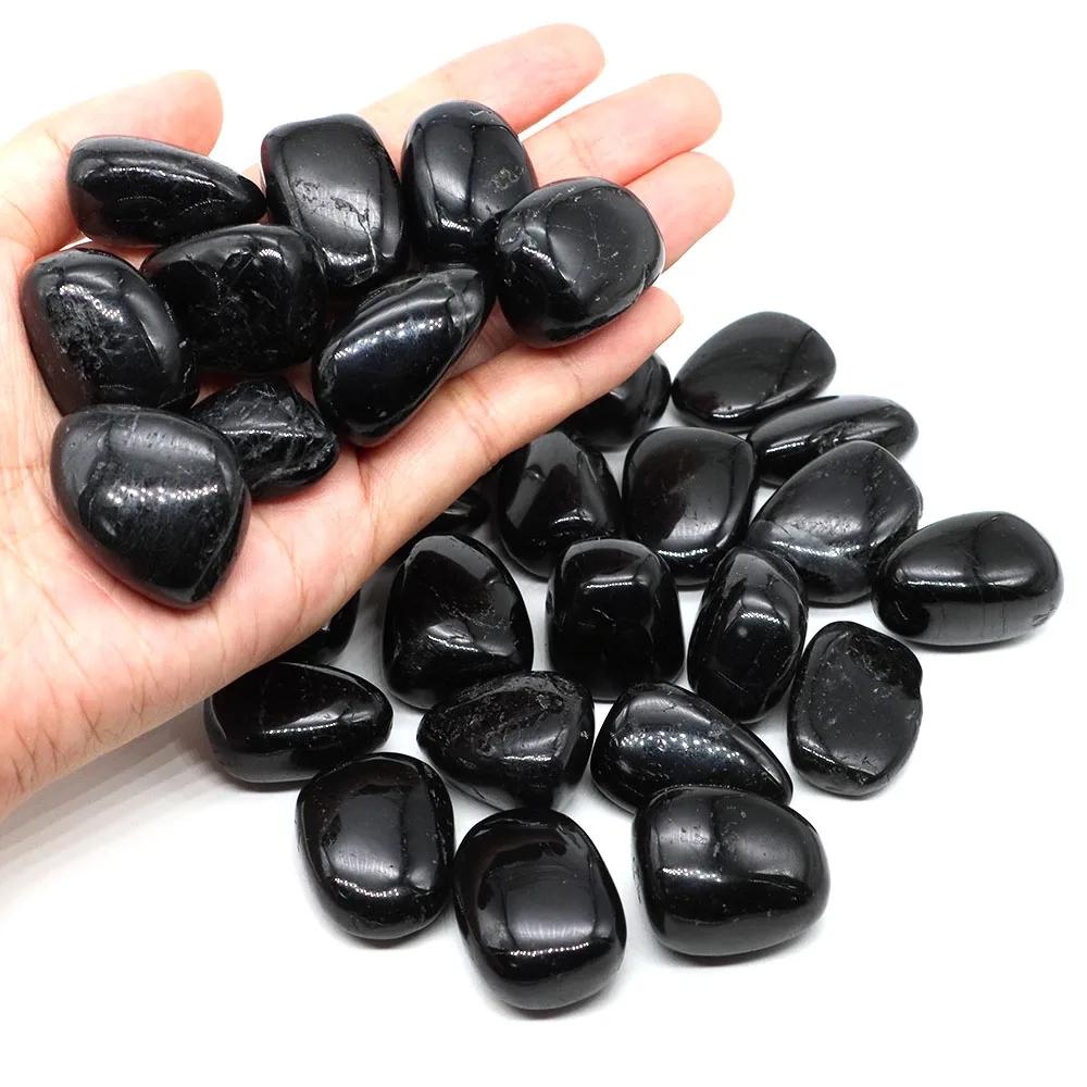 Skillfully processed black tourmaline reflecting light and creating a cozy atmosphere
