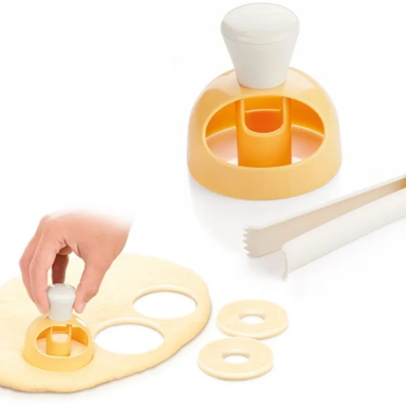 Donut mold on the table, surrounded by baking ingredients