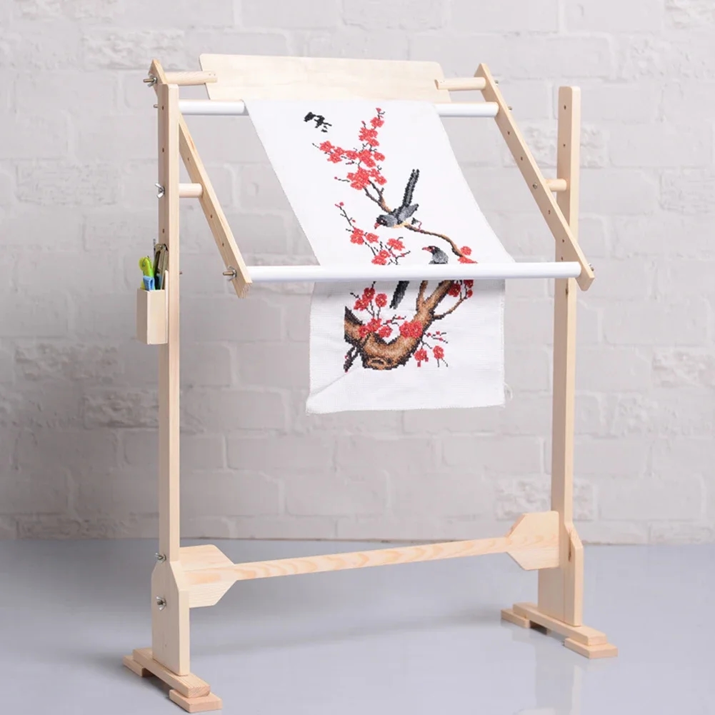 Detailed view of the wooden frame for cross-stitch embroidery